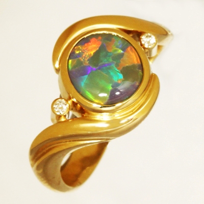 Custom Made 18k Yellow Gold Ring with a SOLID SEMI BLACK OPAL Large rolling flashes of the brightest fire. With VIDEO